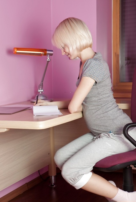 Hairy babe Margarita shows off her tiny breasts & spreads her moist femininity