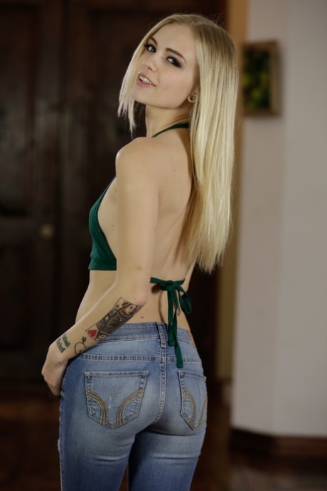 Petite blonde girl Alex Grey slips off her ripped jeans to model in the artistic