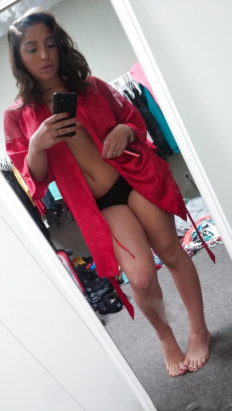 Self shots of busty teenager Abella Banger getting dressed