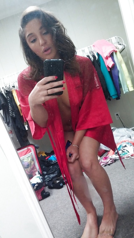 Self shots of busty teenager Abella Banger getting dressed