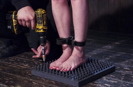 Blonde Cherry Torn endures whipping, caning & pinning in intense BDSM action