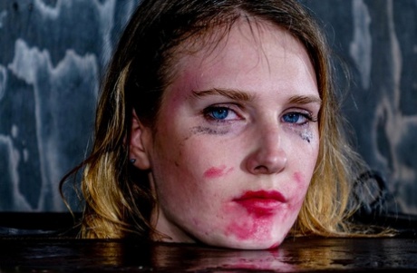 Restrained blonde Ashley Lane sports welt marks while being masturbated