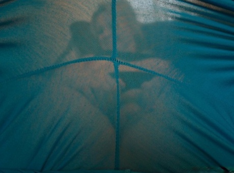 Mature BBW Daniella English frees her bush from yoga pants and thong panties