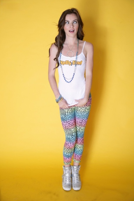 Likable girl Emma Stoned in leggings lets man take pictures of tiny titties