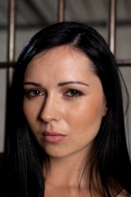 Hottie Angell Summers shows her big curves and her breasts natural in a prison