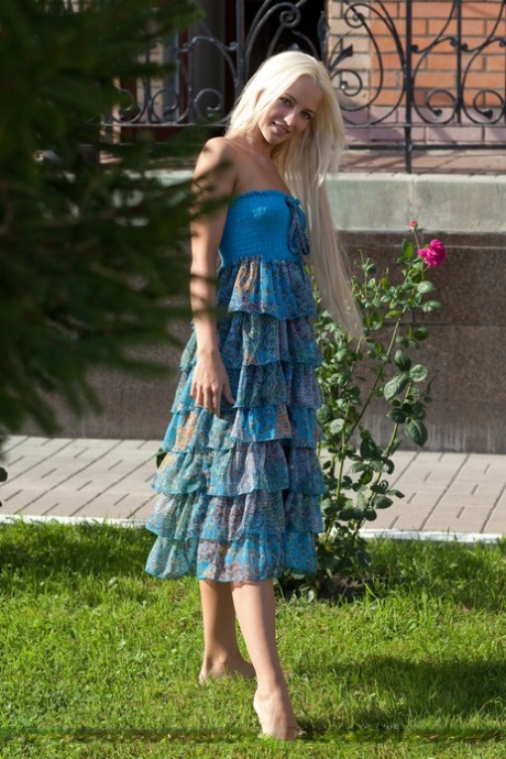 Sweet blonde girl Alysha A flashing shaved cunt outdoor in no panty upksirt