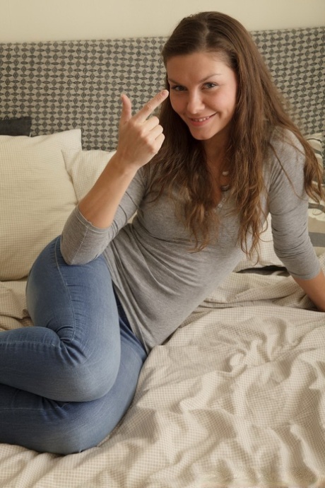 Sweet young adult Christel seduces her stepbrother while wearing jeans