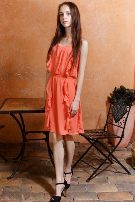 Very skinny girl Lapa removes her dress to bare her scrawny curves and femininity