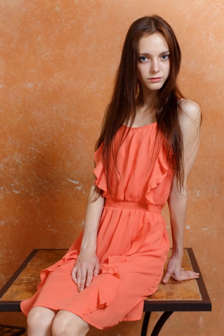 Very skinny girl Lapa removes her dress to bare her scrawny curves and femininity