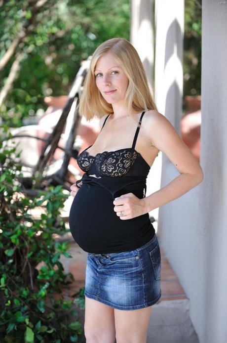 Horny pregnant babe Leah tries out masturbation to climax with a monster dildo