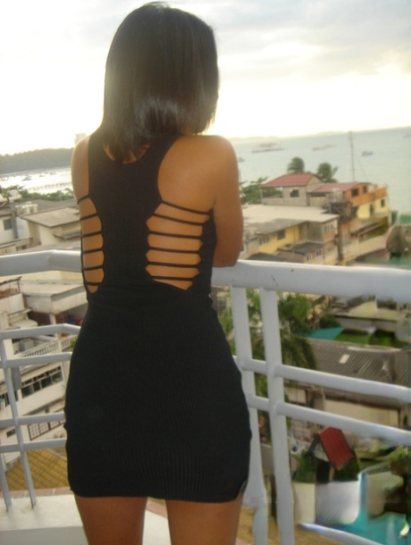 Thai girl Sa spreads her legs to masturbate on toilet after teasing on balcony