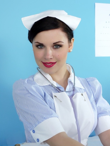 Alluring vintage nurse Jocelyn-Kay removes her uniform to cheer up the patients