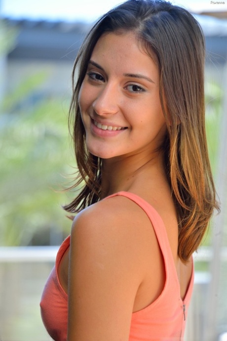 Adorable skinny young adult Roxanna flashes her trimmed vagina in public