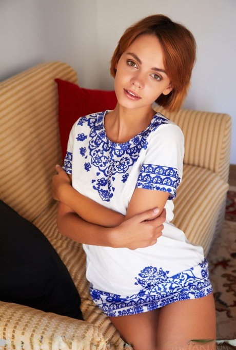 Redhead young adult Lilit A proudly shows her edible femininity with no clothes on