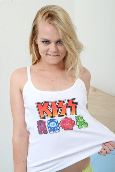 Eighteen-year-old sweetie Bridgette Skies poses in lace panties on bed