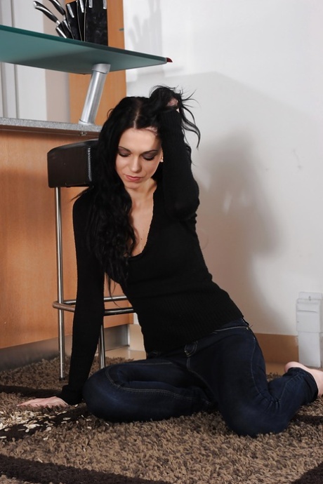 Raven haired beauty Hooovered spreads her bald pink gash wide