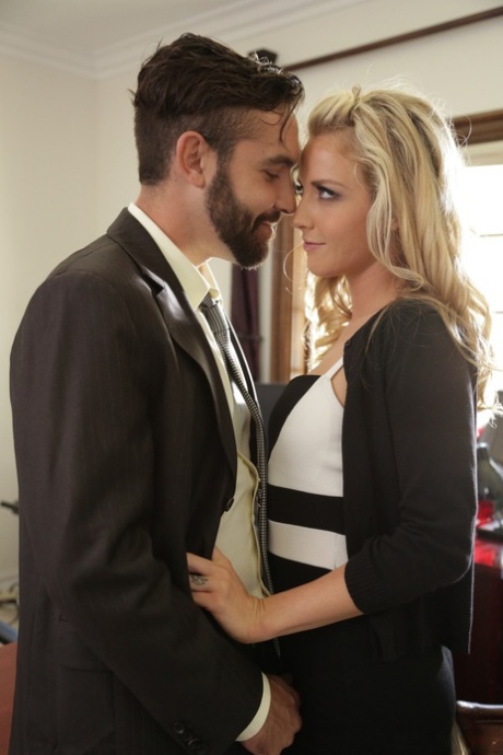 Dark-haired lady goes out of the office and lefts Karla Kush alone with Daniel