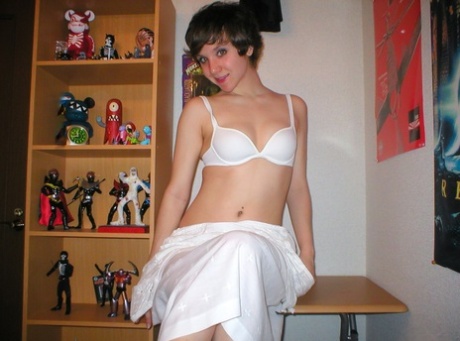 Pretty short-haired schoolgirl surprises with artistic pics taken by herself