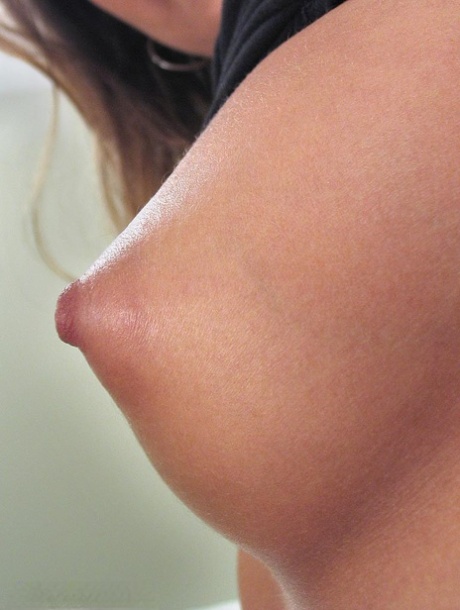 Carmen strips her black panties to bare legs and shaved cunt close up