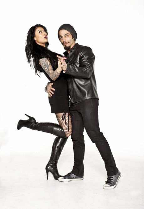 Tattooed alluring pornstar Asian showing big breasts in sheer lingerie