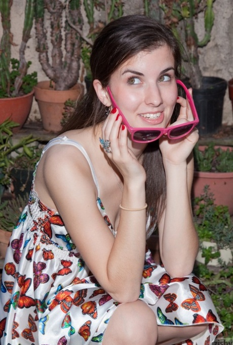 Adorable authentic young adult Melissa Johnston removes her dress and poses in undies