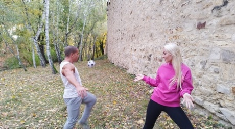 Blonde young adult Lovita Fate participates in MMF intimacy with older guys