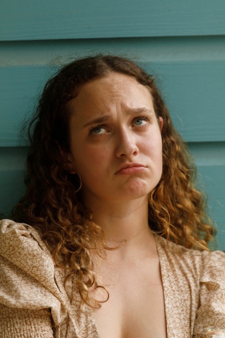 Beautiful curly haired authentic Carrie Barber shows her big curves in panties