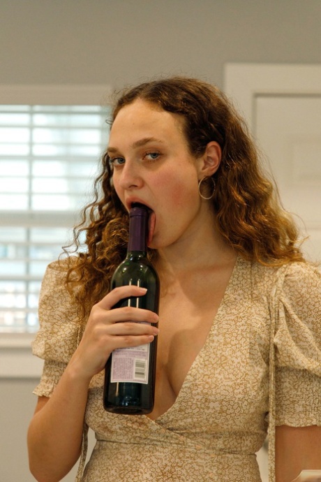 Beautiful curly haired authentic Carrie Barber shows her big curves in panties