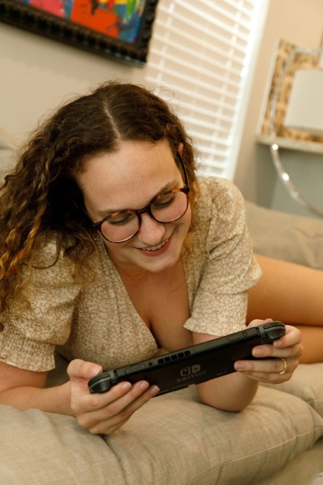 Beautiful curly haired authentic Carrie Barber shows her big curves in panties