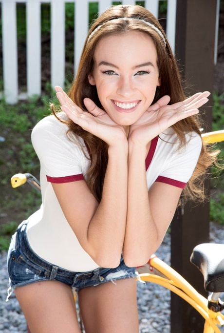 Thin bicycler Charity Crawford shows her bar curves on the bike path
