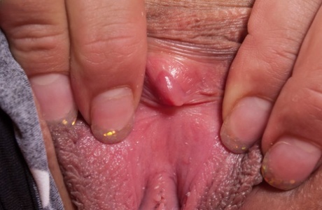 Smiley authentic young adult Scarlet Red spreading her puffy femininity up close