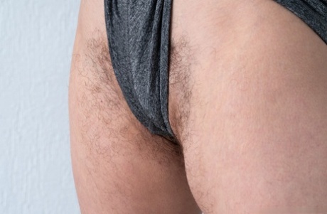 Hirsute authentic Nimfa Mannay stretches out her natural femininity before vacuuming