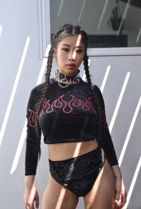 Seductive and busty Asian young adult Jade Kush gets her femininity smashed hard