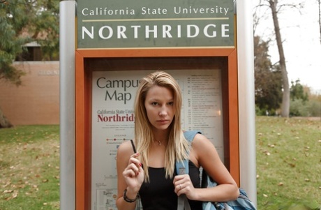 Young adult babe Heidi Bichette flashing her white panties under skirt outdoors