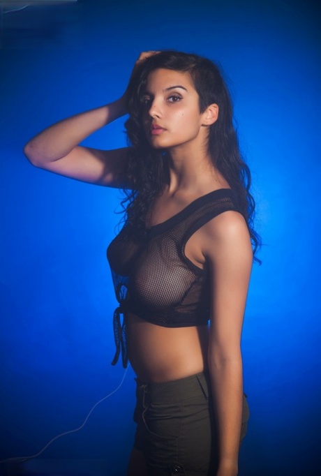 Indian female models non artistic in a see thru top and shorts