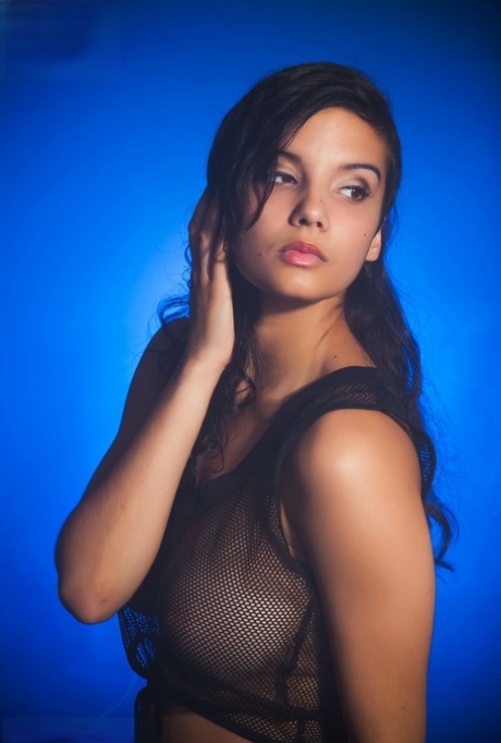 Indian female models non artistic in a see thru top and shorts