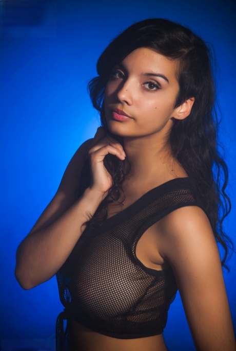 Indian female models non artistic in a see thru top and shorts