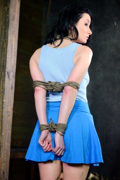 Dark haired girl with firm breasts Veruca James gets face fucked while in bondage