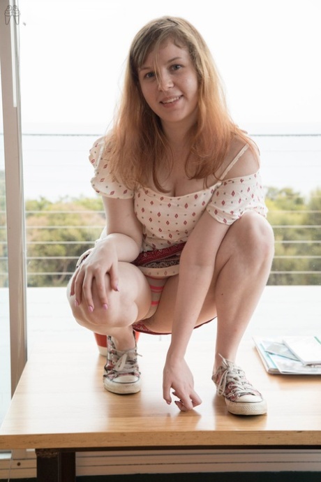 Authentic masturbating chick exposing breasts and fingering her cunt