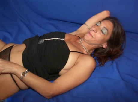 Brunette first timer with saggy breasts sucks a manhood before riding on top