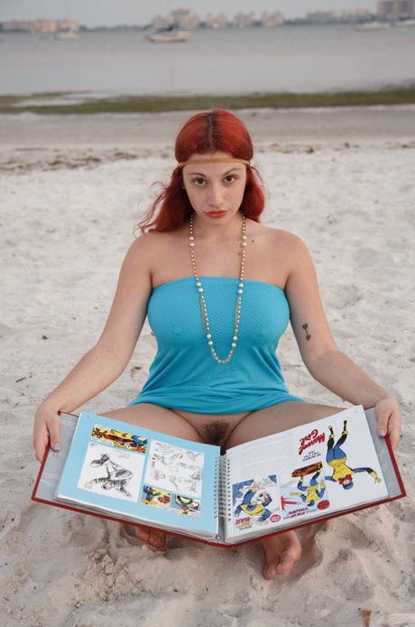 Curvaceous redhead Gina Rosini flashes her big breasts round curves and hairy twat