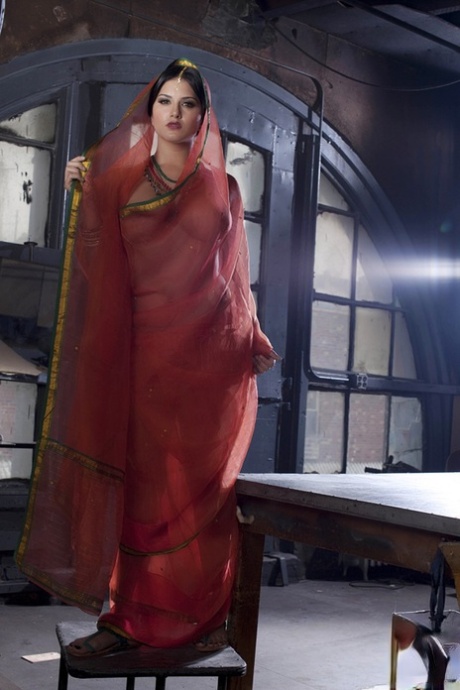 Busty solo girl Sunny Leone models solo in see thru Indian attire