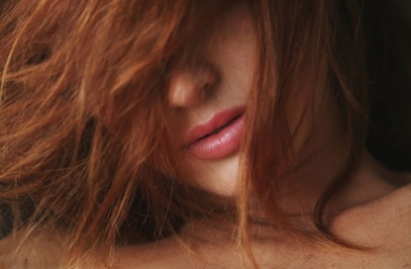 Attractive redhead sleeping beauty Micca awakens to spread her horny morning femininity