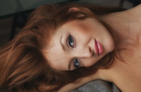 Attractive redhead sleeping beauty Micca awakens to spread her horny morning femininity