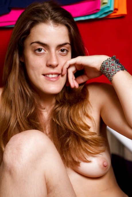 Slutty babe with hairy armpits stripping and spreading her legs