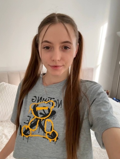 Cute young girl Katya Sun poses her numerous non-nude self shots