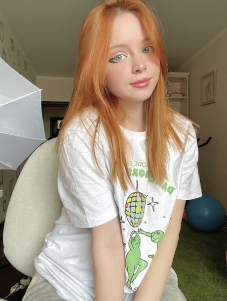 Redheaded OnlyFans young adult Olash Peachy posing in her kinky compilation