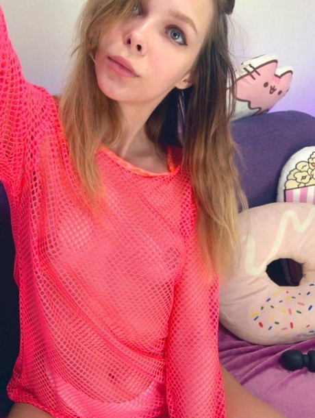 Authentic OnlyFans young adult Little Kitty poses natural & in her alluring outfits