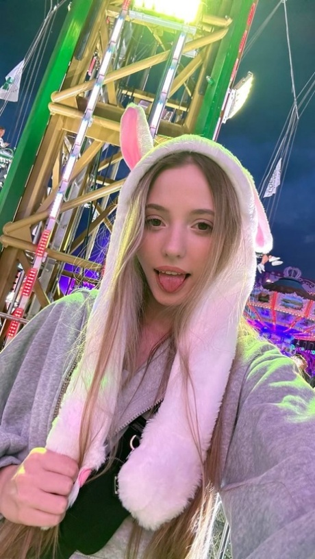 Charming blonde young adult Katya Sun takes numerous self shots in SFW mode