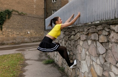 Ukrainian babe Oxana Chic flashes her curves in pantyhose in public